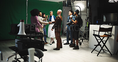 Handshake, team and director in studio for creative production, filming and shooting success. Behind the scenes, filmmaking and cast with crew celebrate for good job, well done and thank you on set