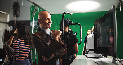 Buy stock photo Man, movie director or watching scene in studio with cameraman for action, playback or recording. Male person, producer or manager with production crew for preview, film making or green screen in set