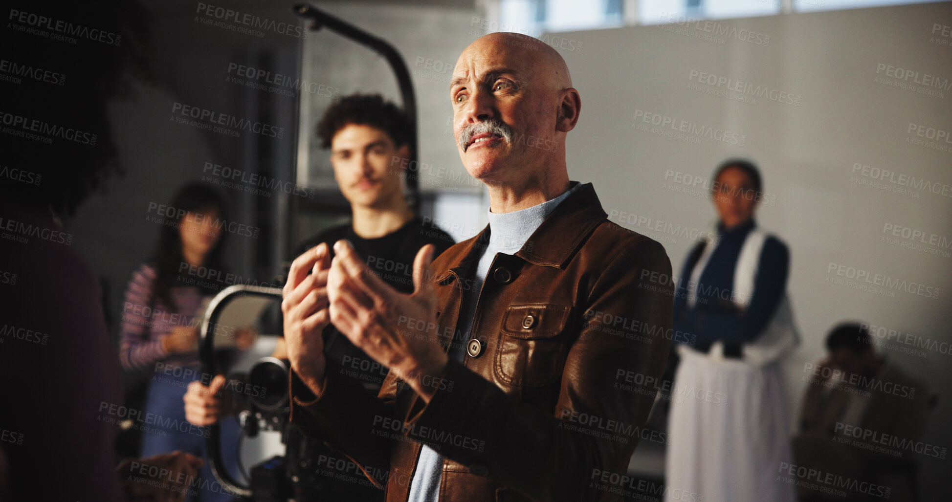 Buy stock photo Director, advice and talking with man on film set for production guide, shooting and discussion. Artistic vision, videography direction and instruction with people in movie studio for performance