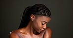 Skincare, beauty and African woman in studio for body care, satisfaction and spa wellness. Space, dark background and person with smooth skin, glow and shine for hydration, dermatology and cosmetics