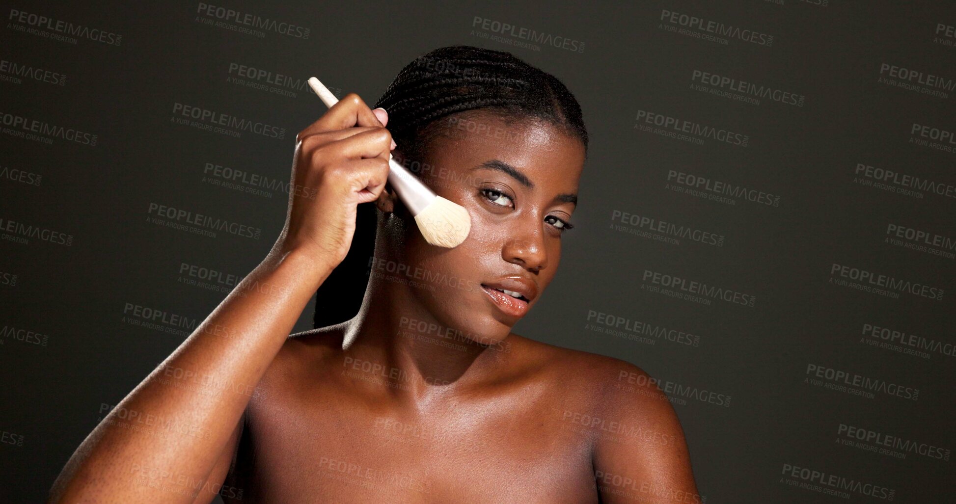 Buy stock photo Brush, makeup and portrait of black woman in studio with beauty, makeover and self care. Cosmetic tool, face and African female person with facial cosmetology for foundation by gray background.
