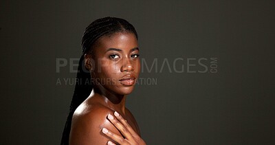 Buy stock photo Beauty, shoulder and portrait of black woman in studio for skincare, hydration and glow. Shine, aesthetic and dermatology with person on dark background space for  hygiene, clear skin and body care