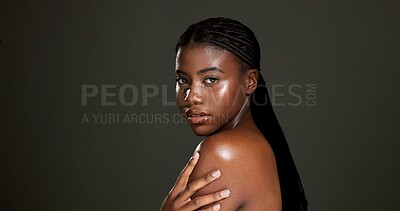 Buy stock photo Glow shoulder and portrait of black woman in studio for skincare, hydration and beauty. Shine, aesthetic and dermatology with person on dark background space for  hygiene, clear skin and body care