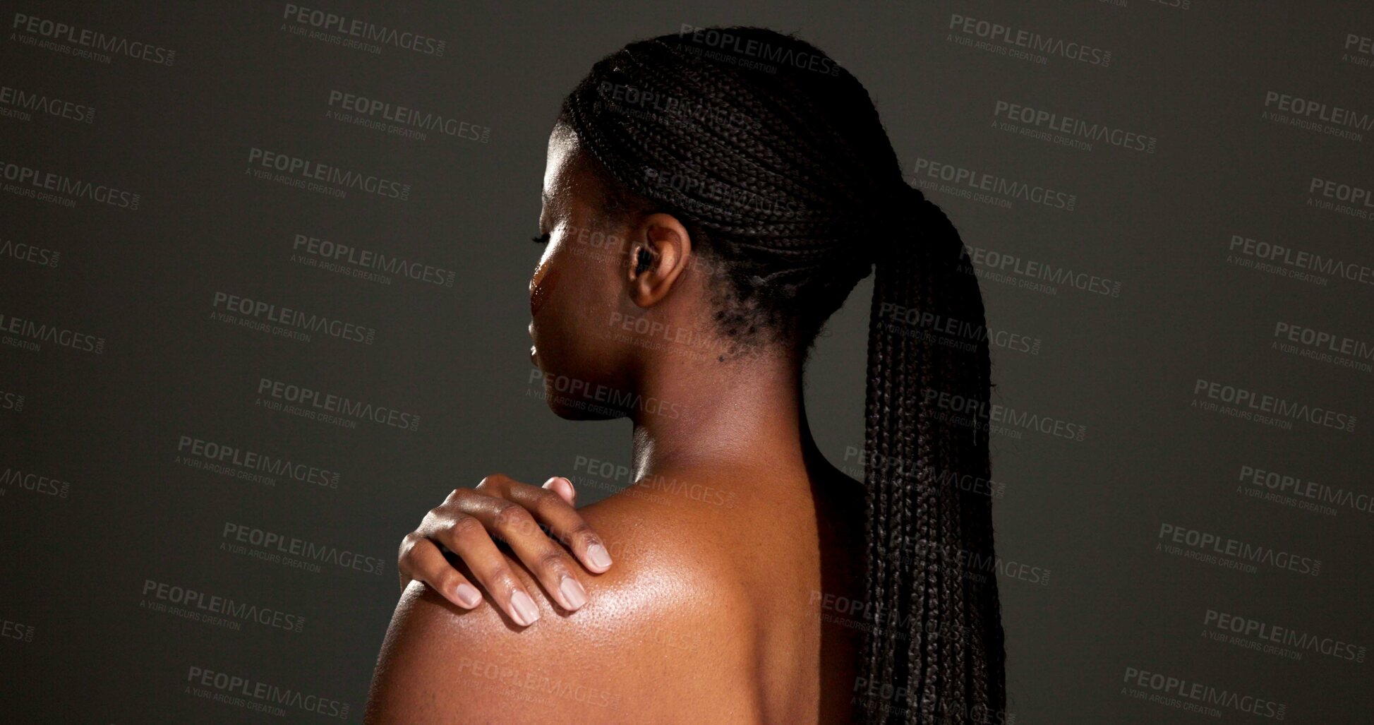 Buy stock photo Beauty, glow and shoulder with back of black woman in studio for skincare, smooth texture or dermatology. Hygiene, aesthetic and shine with person on dark background space for hydration and body care