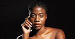 Black woman, portrait and skincare with makeup in studio for beauty cosmetics on a dark background. Face, female person or African model with skin glow for brightening, shine or contour on space