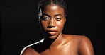 Skincare, glow and portrait of woman in studio for beauty, dermatology and self care. Aesthetic, hydration and collagen with female person on dark background space for shine, hygiene and clear skin