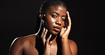 Skincare, beauty and portrait of black woman in studio for glow, dermatology and self care. Aesthetic, hydration and collagen with person on dark background space for shine, hygiene and clear skin