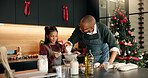 Baking, father or child with flour on Christmas for holiday cake recipe, helping hand or learning. Happy family, african people or mix ingredients in home for xmas cookies, festive dessert or support