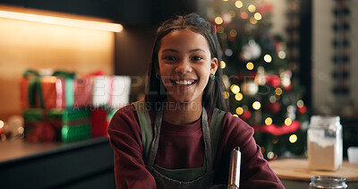 Buy stock photo Christmas, portrait or happy child baking with smile in kitchen for festive tradition, recipe or food. Kid, snack or face of girl in home for holiday celebration, cooking skills or xmas meal prep