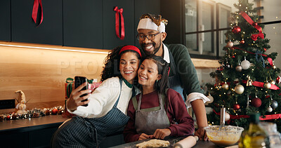 Buy stock photo Parents, child and selfie in kitchen for Christmas photography, baking cookies and bonding. Happy, family and kid for social media post, holiday preparation and dessert for festive tradition at house