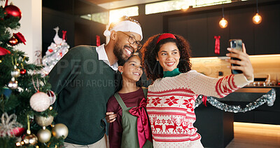 Buy stock photo Happy, parents and selfie with child for Christmas photography, social media update and bonding. Smile, family and kid with profile picture post, festive tradition and memory for celebration at house