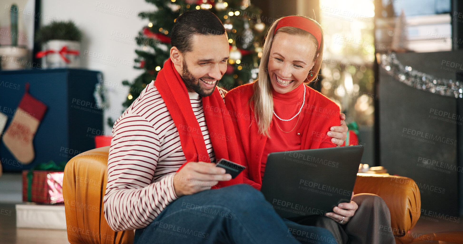 Buy stock photo Christmas, home and couple with laptop, credit card and search for gifts, festive and online banking. Transaction, digital payment and man with woman, pc and ecommerce with holiday season and Xmas