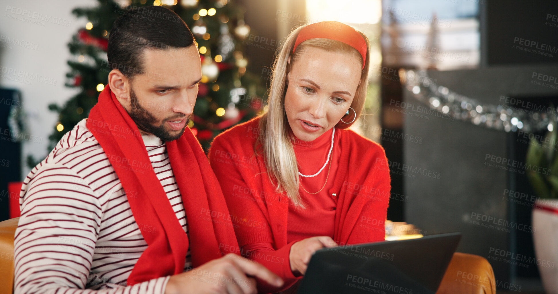 Buy stock photo Xmas, home and couple with tablet, love and search for gifts, tradition and bonding together. Social media, internet and man with woman, tech and online entertainment with holiday season or Christmas
