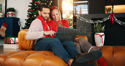 Buy stock photo Christmas, home and couple with laptop, smile and search for gifts, festive and online website. Connection, love and man with woman, tech and entertainment with holiday season, internet and Xmas