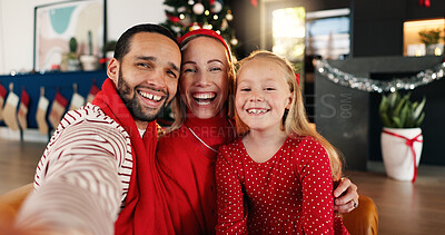 Buy stock photo Christmas, happy and selfie of family in living room of home together for celebration or memories. Excited, POV or smile with husband, daughter and woman in apartment for festive profile picture