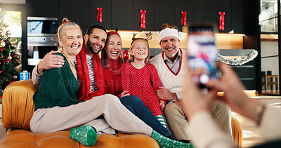 Buy stock photo Photography, happy and family in home for Christmas memory, celebration or social media post. Smile, holiday and girl child with parents and grandparents for picture on xmas for festive season.