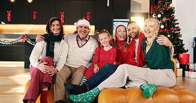 Buy stock photo Portrait, smile and family in home for christmas memory, celebration or relaxing together. Happy, holiday and girl child with parents and grandparents on sofa for xmas, event or festive season.