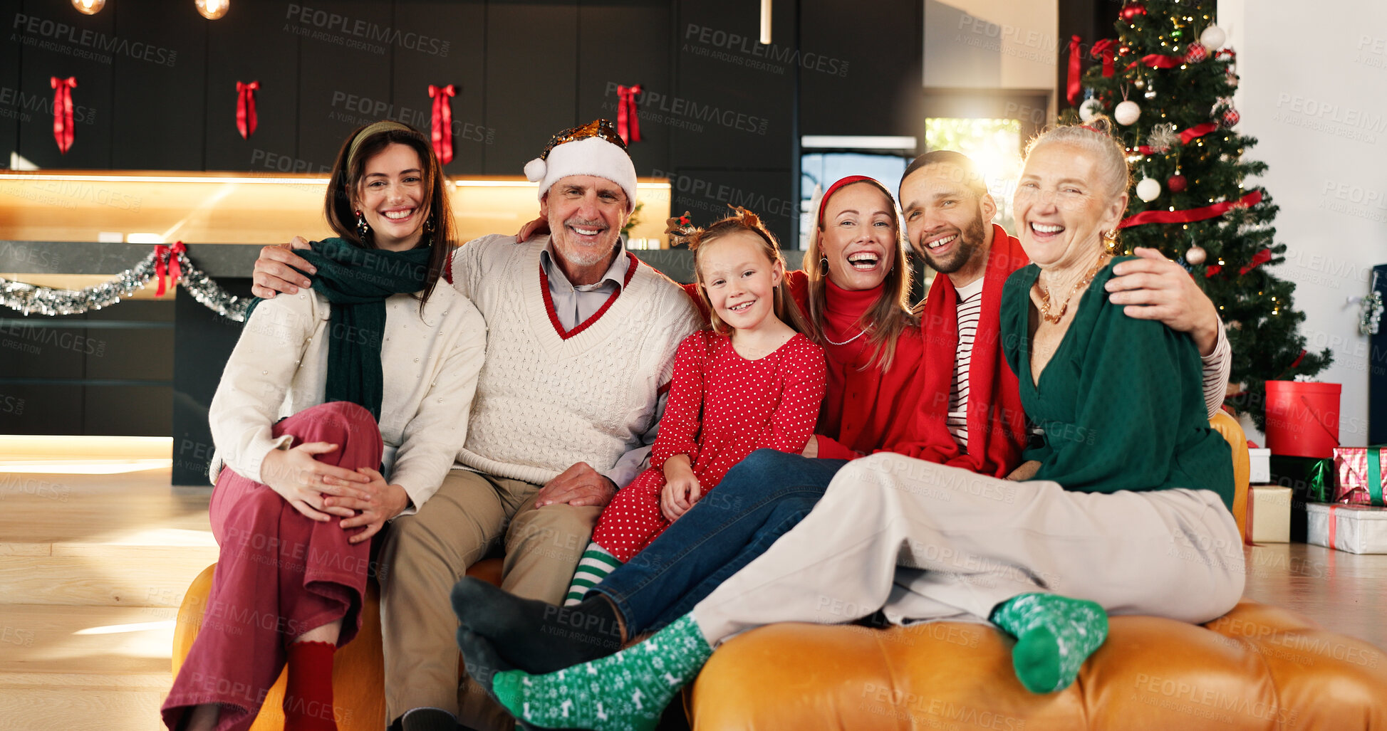 Buy stock photo Portrait, smile and family in home for christmas memory, celebration or relaxing together. Happy, holiday and girl child with parents and grandparents on sofa for xmas, event or festive season.