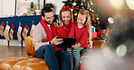 Christmas, happy family and kid with tablet for relax, gift shopping and watch cartoon on holiday. Tech, mom and dad with girl for xmas movie, bonding and present choice with parents online in home