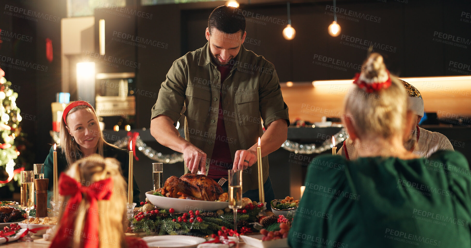 Buy stock photo Smile, man and cutting turkey for Christmas celebration, dinner meal and social gathering. Happy, family and hosting with chicken for cuisine of festive tradition, feast reunion and bonding at house