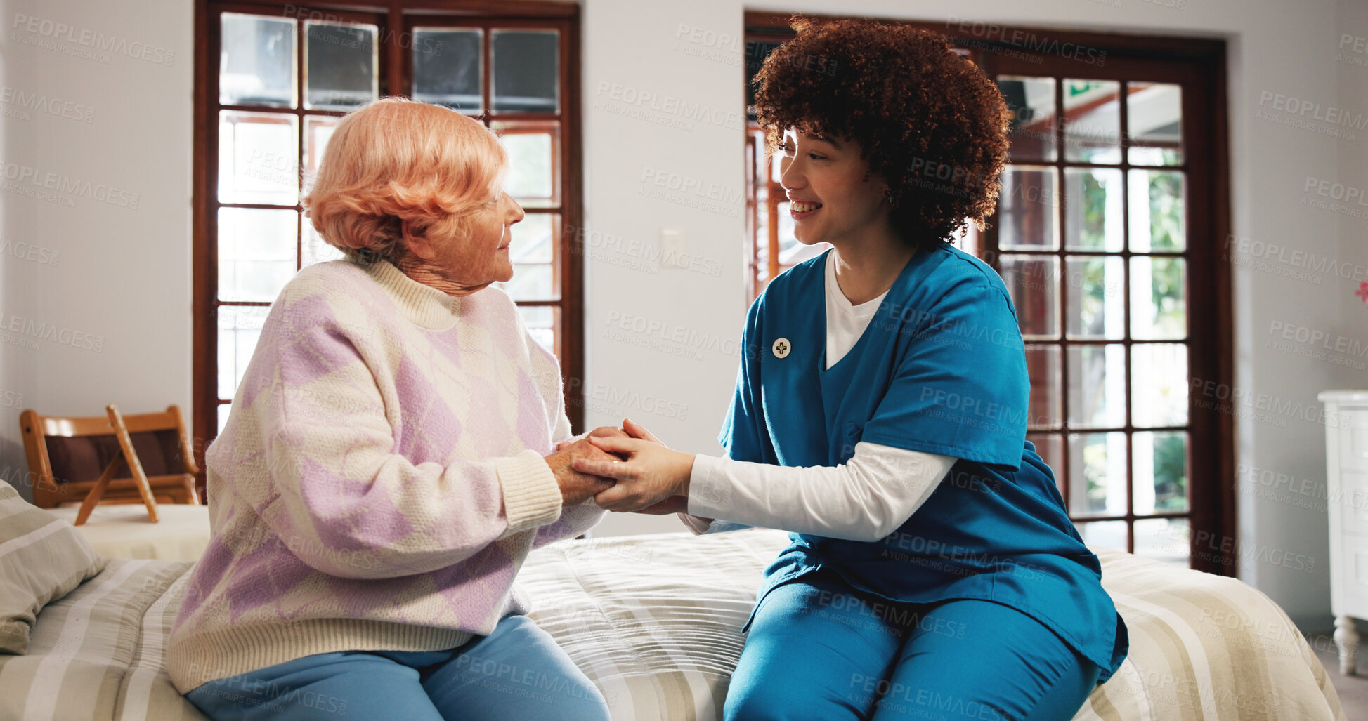 Buy stock photo Holding hands, talking and nurse with elderly woman in bedroom for support, help and care in nursing home. Retirement, healthcare and caregiver with old person for empathy, conversation or consulting