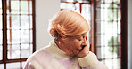 Senior, sad woman and crying with emotion in retirement home for grief, loss or loneliness. Elderly, female person or tears with sadness or pain for mental health, stress or mourning in old age house