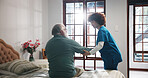 Senior man, nurse or helping patient on bed for assisted living or support in retirement home. Male person, caregiver or assistance in bedroom with client for elderly care or nursing in old age house