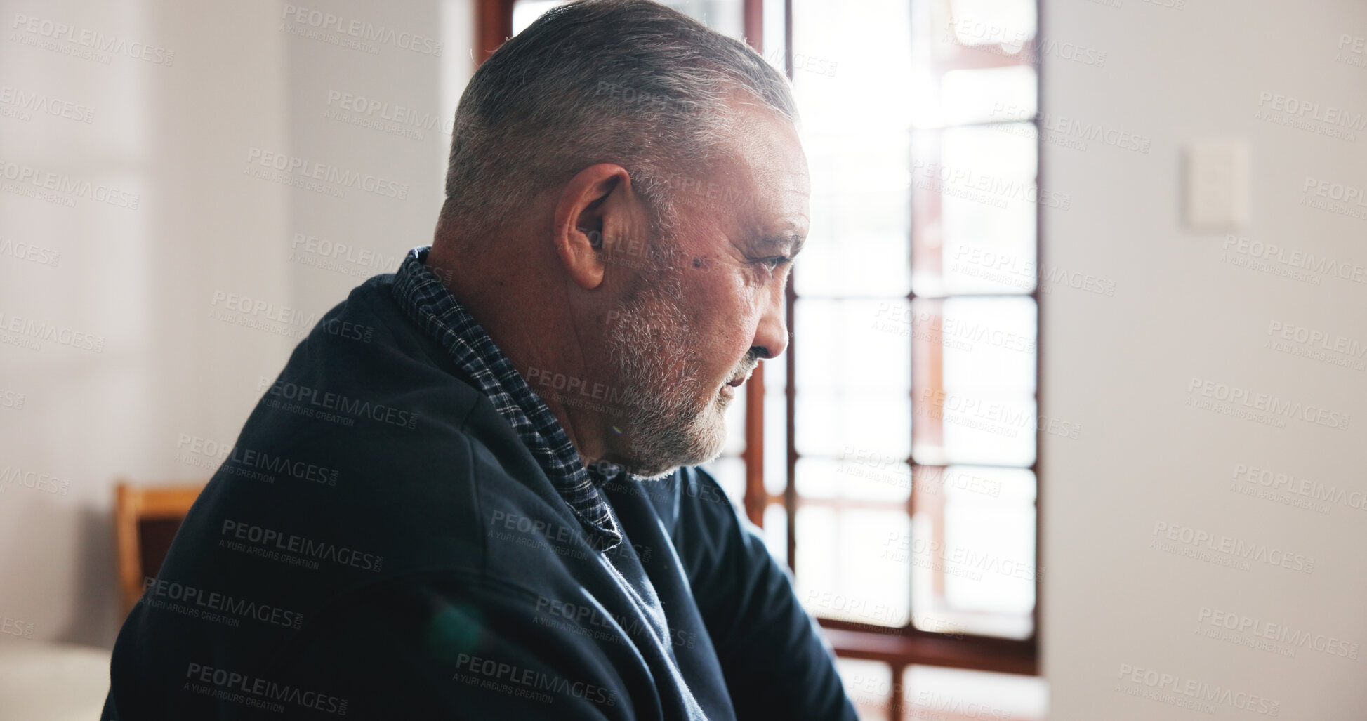 Buy stock photo Sad, senior man and loneliness in nursing home, thinking and pensioner with Alzheimer and depressed. Mental health, reflection and old person with dementia, remember and retirement in house or alone