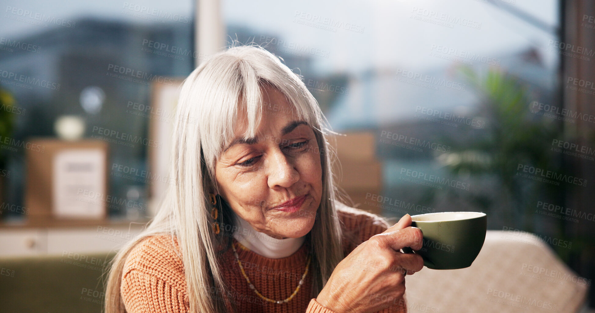 Buy stock photo Senior woman, coffee and thinking on sofa with smile, reflection and inspiration in retirement home. Person, relax and perspective with memory, happy and drink with tea cup in living room at house