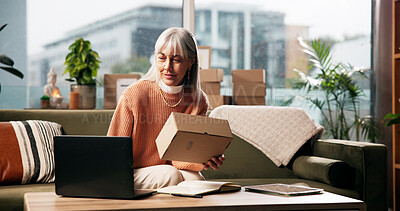 Buy stock photo Ecommerce, woman and box with laptop in home for order update, package details or check inventory. Dropshipping, mature person and technology in lounge for supply chain, remote work or small business