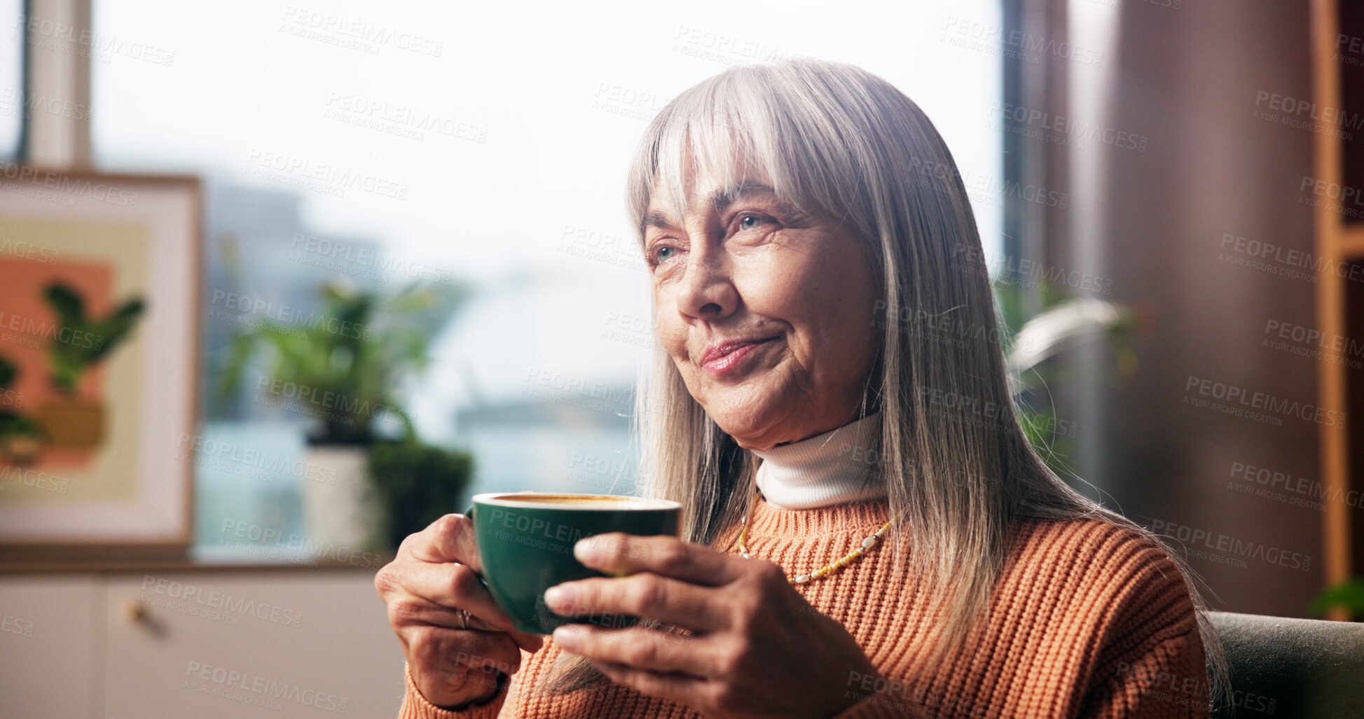 Buy stock photo Senior woman, coffee and thinking in home with happy memory, daydreaming and peaceful break. Smile, relax and old person with warm beverage on sofa for retirement, nostalgia and reflection in lounge