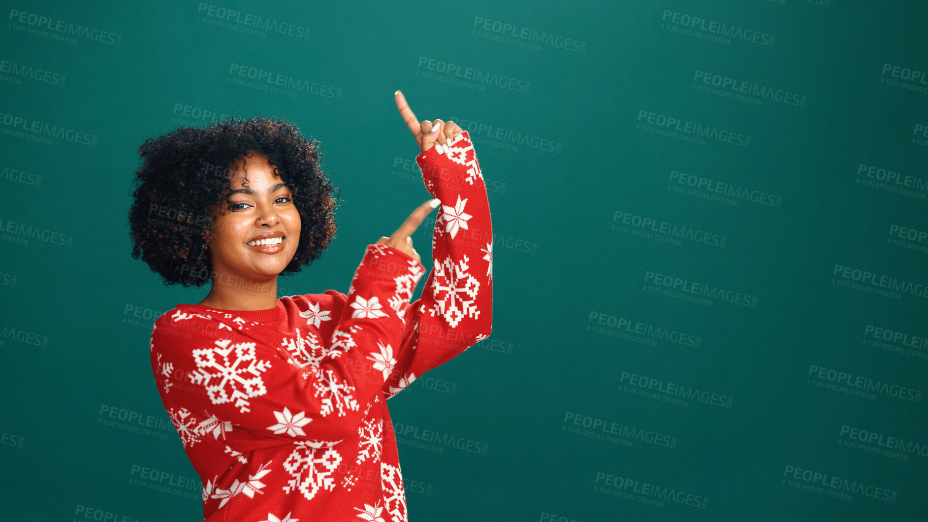 Buy stock photo Christmas, pointing and portrait with woman in studio for holiday season, celebration and promotion. Festive deals, xmas event and announcement with person on green background space with mockup