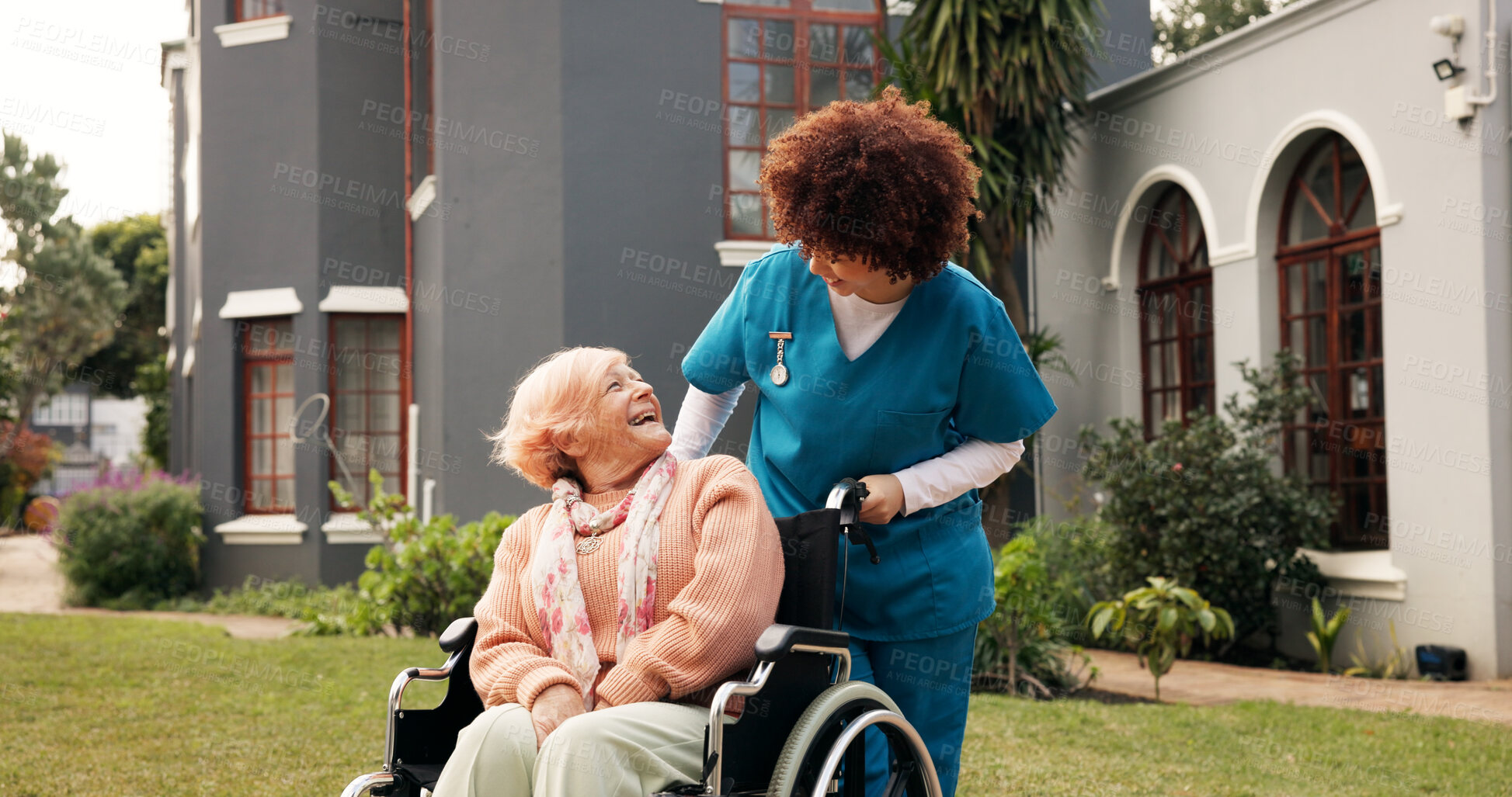 Buy stock photo Nurse, old woman and happy outdoor with wheelchair, laugh and recovery with joke at retirement home. Caregiver, funny chat and elderly person with disability, assistance and injury in garden