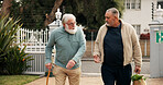 Home, groceries and senior man with help for assistance, support and care walking to door. Retirement, friends and elderly people with shopping bag of food outdoor for kindness, talking and chat