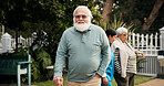 Senior man, portrait and walking stick in garden, smile and outdoor for recovery, healing and injury. Elderly person with disability, cane and rehabilitation process for stroke at retirement village