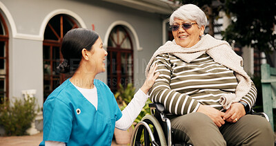 Buy stock photo Happy, outdoor and nurse with senior woman in wheelchair for fresh air, wellness and support. Retirement, nursing home and caregiver talking to elderly person with disability in garden for relaxing