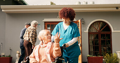 Buy stock photo Nurse, old woman and talk outdoor with wheelchair, push and recovery with healing at retirement home. Caregiver, conversation and elderly person with disability, rehabilitation and injury in garden