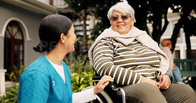 Buy stock photo Nurse, old woman and smile outdoor with wheelchair, talk and listen with recovery at retirement home. Caregiver, happy and elderly person with disability, rehabilitation or injury with chat in garden