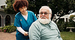 Wheelchair, nurse and help with old man outdoor for healthcare, occupational therapy and support. Kindness, rehabilitation and medical advice with person with a disability in nursing home for trust