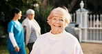 Happy, outdoor and portrait of senior woman with smile for fresh air, wellness and relaxing in garden. Retirement, nursing home and elderly person in nature for peace, health and assisted living