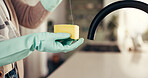 Cleaning, sponge and hands of person in kitchen for washing, hygiene and bacteria prevent. Sanitary, safety and dirt with cleaner and liquid in home for soap, housekeeping and germ disinfectant