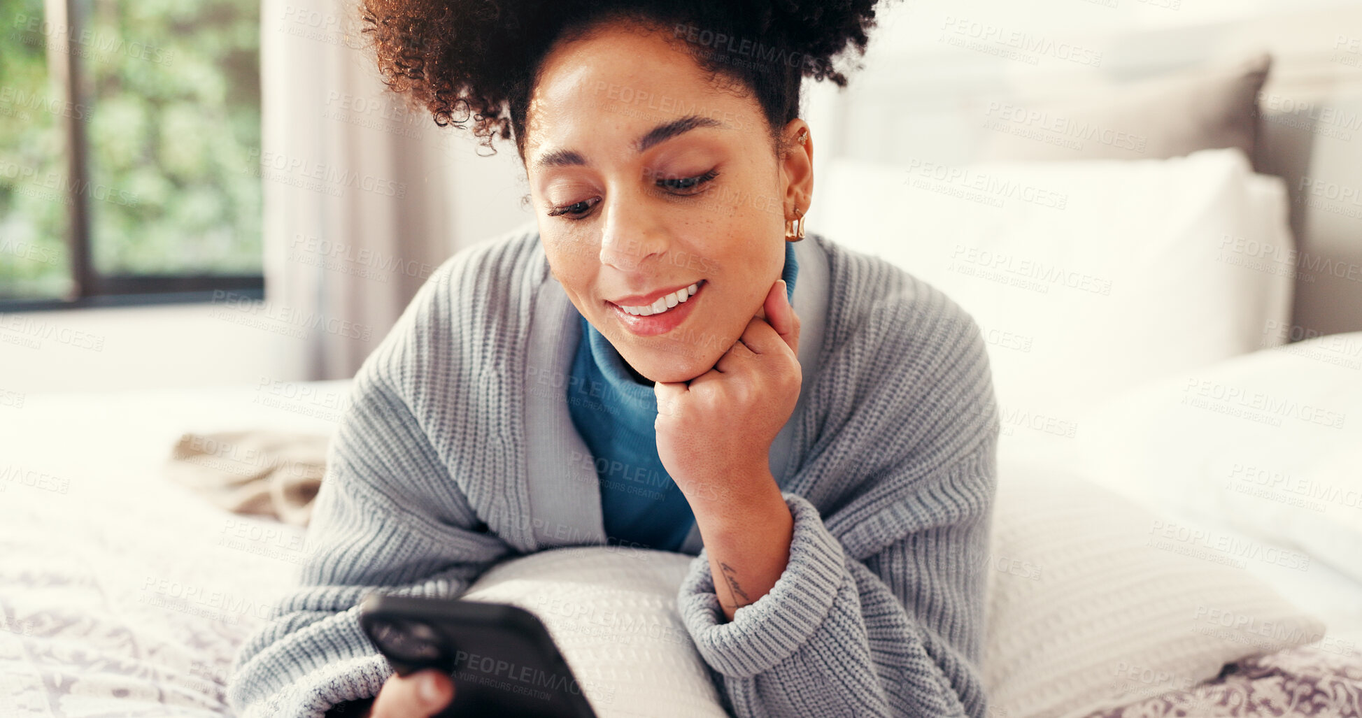 Buy stock photo Happy, weekend and woman with phone on bed for social media, networking and online chatting. Home, bedroom and person on smartphone for connection to internet, website or typing message on mobile app