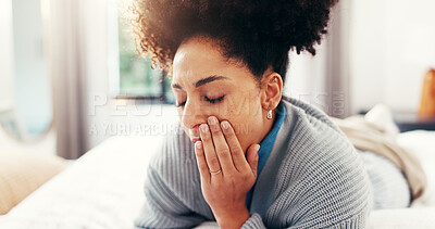 Buy stock photo Sensitive, pain and woman with toothache on bed with cavity, root canal or impacted wisdom teeth. Inflammation, African person or mouth discomfort in home for dental abscess, infection or gum disease