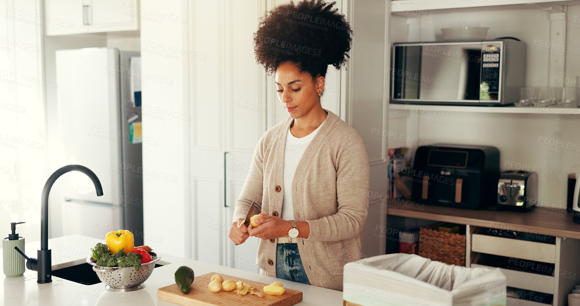 Buy stock photo Chopping, vegetables and woman in home, cooking and culinary skills with healthy food and meal prep. Dinner, process and African person with ingredients for gourmet, nutrition or confident in kitchen