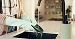 Cleaning, water and hands of person in kitchen for washing dishes, hygiene and bacteria prevent. Sanitary, safety and dirt with cleaner and liquid in home for soap, housekeeping and germ disinfectant
