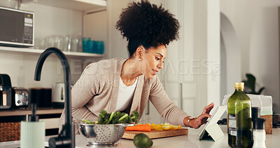 Buy stock photo Cooking, woman and research recipe on tablet, smile and checking for instructions on web and online. Meal prep, process and African person with tech for tutorial, ingredients or social media in house