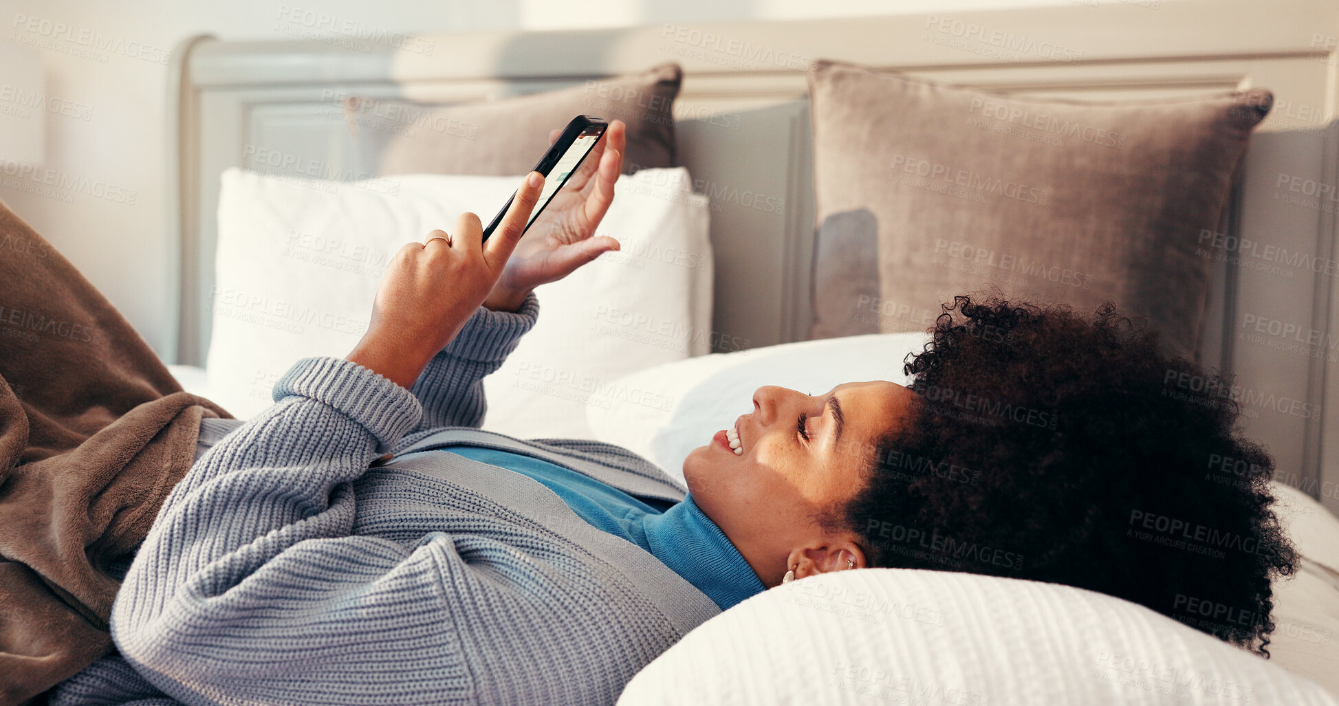Buy stock photo Happy, relax and woman with phone in bedroom for social media, networking and online dating. Home, bed and person on smartphone for connection to internet, mobile app and typing message for contact