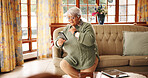 Thinking, senior woman and phone at house for reading message, social media and feedback ideas. Elderly person, contemplating and mobile with online games, browsing website and solution for crossword