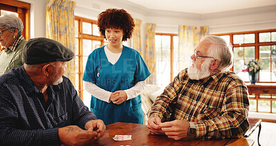 Buy stock photo Elderly men, talk and nurse for playing cards of contest, friendly competition and hobby. Caregiver, chat and senior people with game for retirement entertainment, cognitive activity and nursing home