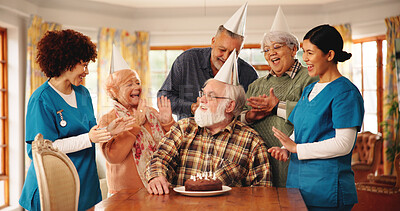 Buy stock photo Birthday cake, senior people and clapping in nursing home for celebration, support or excited. Dessert, retirement group and friends at party, special event and congratulations with medical caregiver